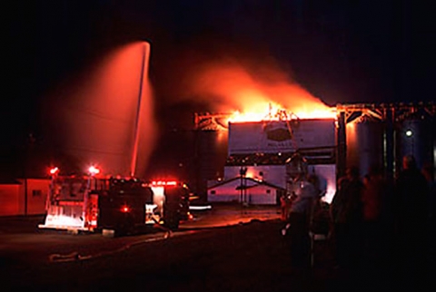 Burning Wheat Pool elevator at Melville, Saskatchewan