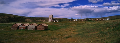 Panoramic image of wooden grain elevator at Sharples Alberta