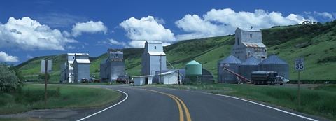 Photograph of wooden grain elevators at Highwood, Montana.