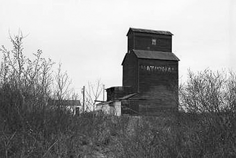 Wooden grain elevator at Poe, Alberta