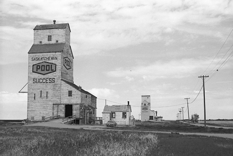 Images of wooden grain elevators at Success, Saskatchewan