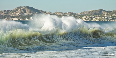 Ocean waves, seascapes, sandy beaches, blues and greens , foam and wave spray,  rolling waves, see through waves.