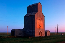 Logo on wooden grain elevator at Sipple, Montana