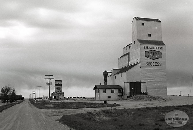 Images of wooden grain elevators at Success, Saskatchewan