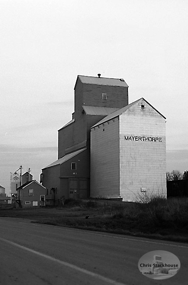 Photograph of wooden grain elevator at Mayerthorpe, Alberta